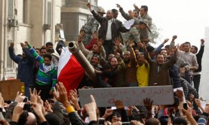 Bringing 'democracy' to people through Arab Spring; but with tanks, bombs and guns (Pic courtesy: www.theguardian.com)